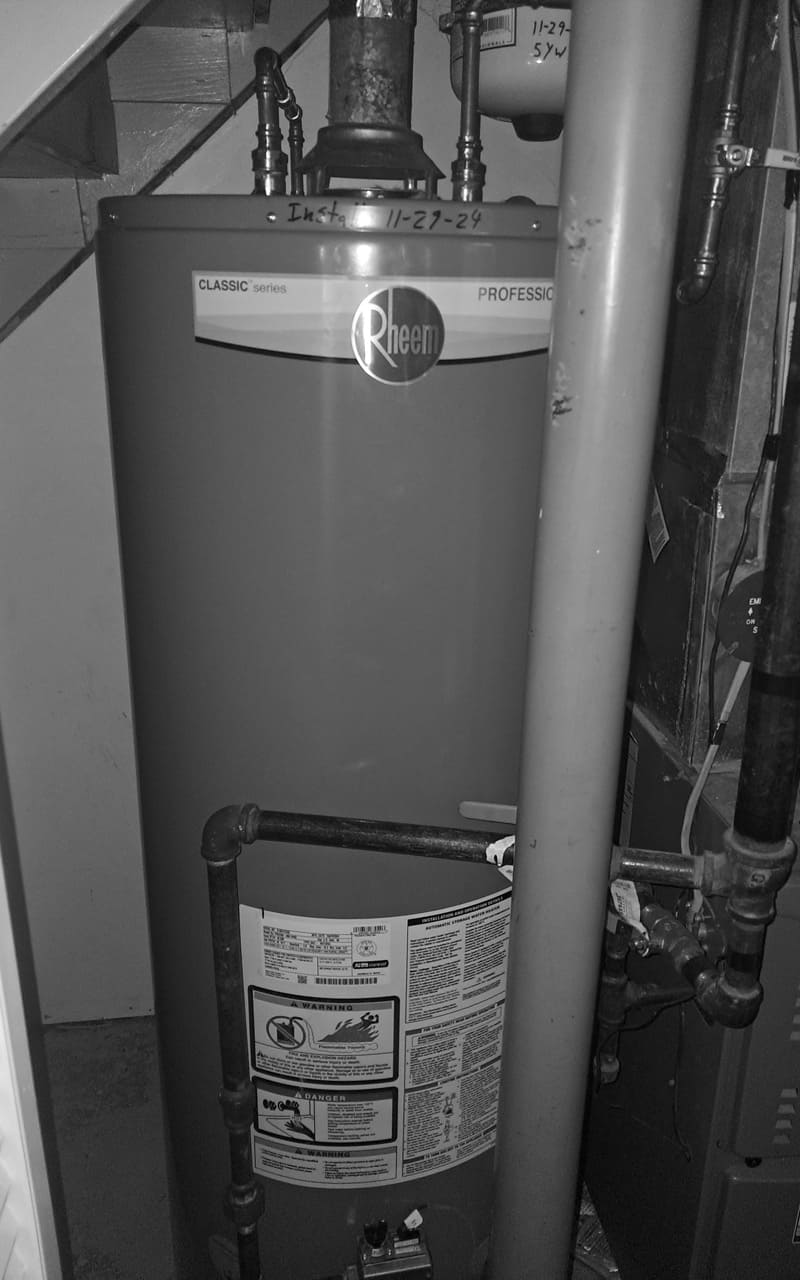 gas water heater tank installed by wj mcnabb plumbing technician