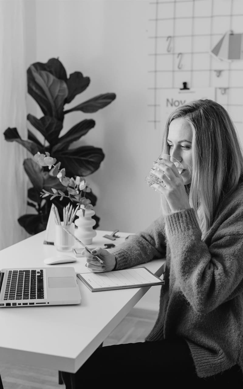 women in pittsburgh home drinking filtered water